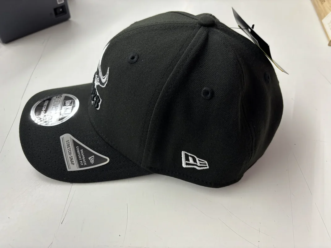 NRL-Cowboys-970SS-Snapback-Cap-Black-White-Left.webp NRL Cowboys 970SS Snapback Cap Black White Left View
