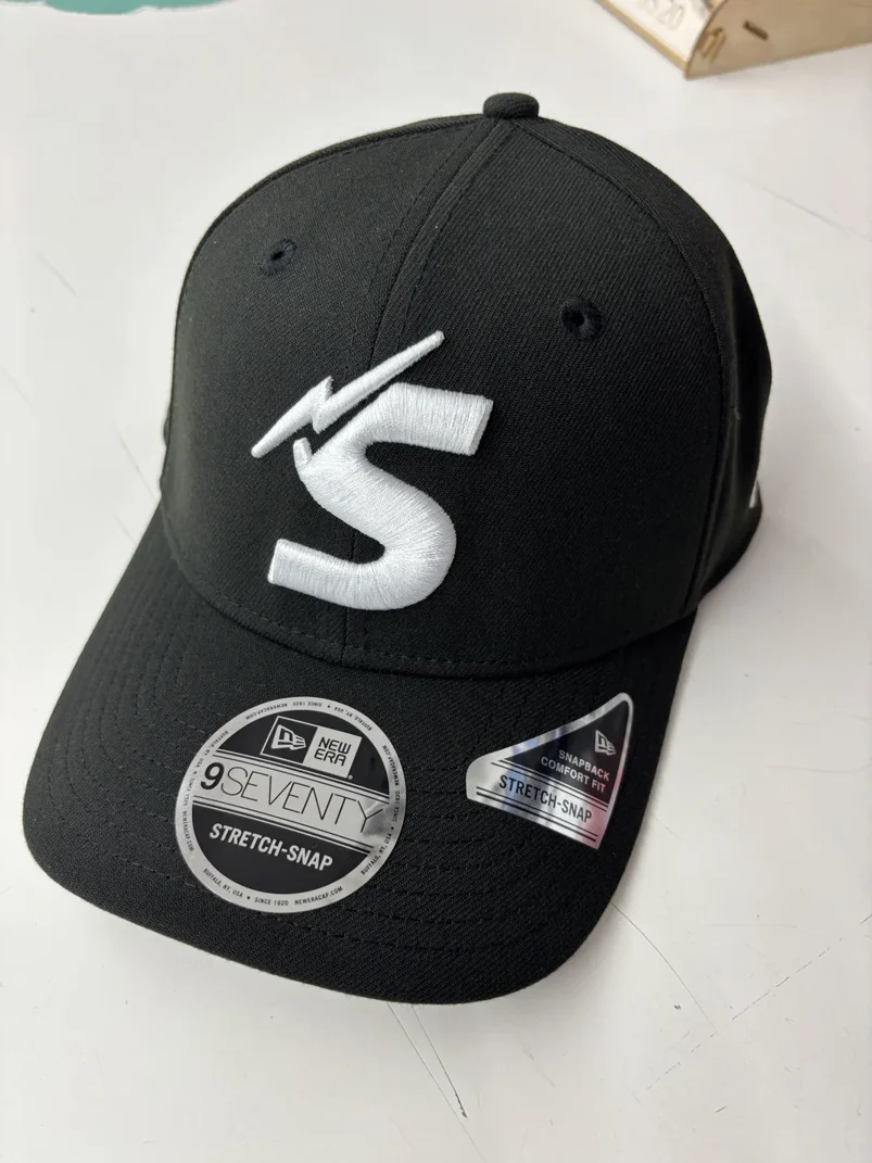 NRL-Storm-970SS-Snapback-Cap-Black-White-Front-Right-2.webp NRL Storm 970SS Snapback Cap Black White Front Right View
