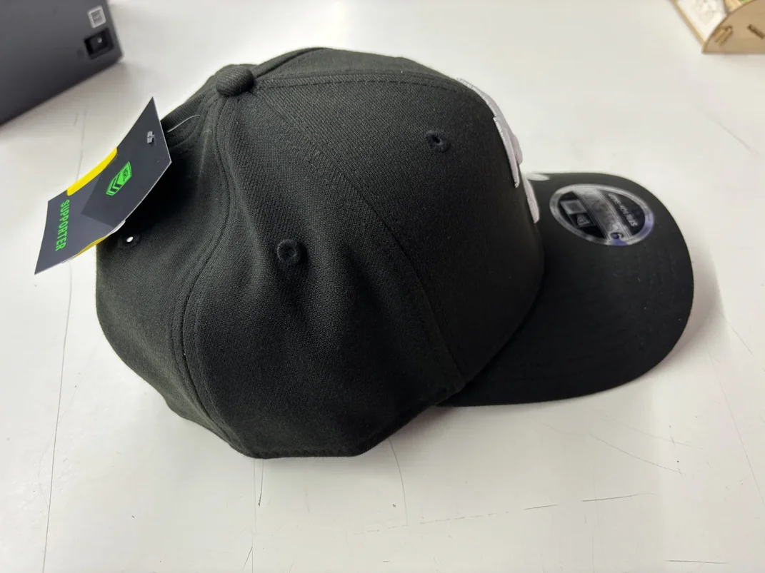 NRL-Storm-970SS-Snapback-Cap-Black-White-Right.webp NRL Storm 970SS Snapback Cap Black White Right View