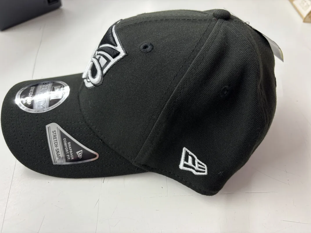 NRL-Warriors-970SS-Snapback-Cap-Black-White-Right.webp NRL Warriors 970SS Snapback Cap Black White Left View