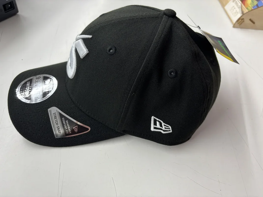 NRL-Storm-970SS-Snapback-Cap-Black-White-Front-Left.webp NRL Storm 970SS Snapback Cap Black White Front Left View