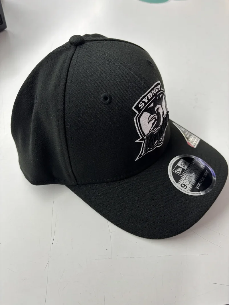 NRL-Roosters-970SS-Snapback-Cap-Black-White-Front-Left.webp NRL Roosters 970SS Snapback Cap Black White Front Left