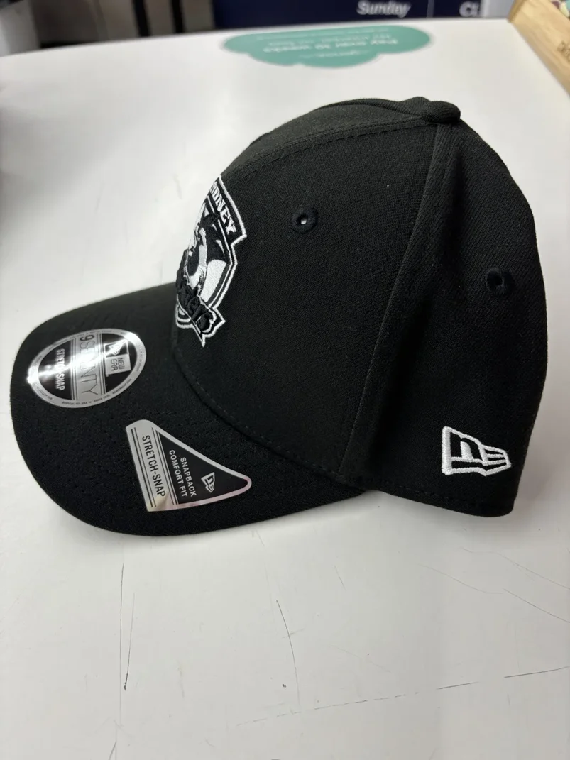 NRL-Roosters-970SS-Snapback-Cap-Black-White-Right.webp NRL Roosters 970SS Snapback Cap Black White Left View