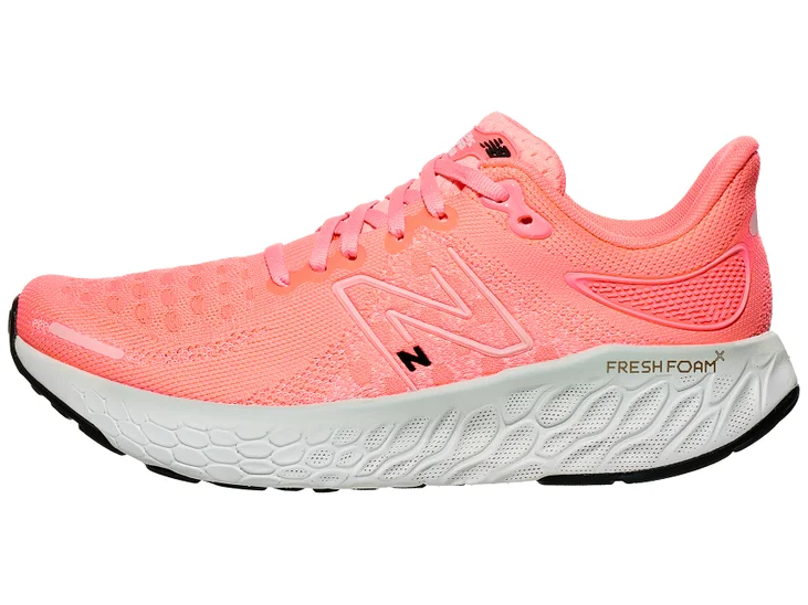 womens-new-balance-1080-v12-grapefruit-confluence-running-1.webp